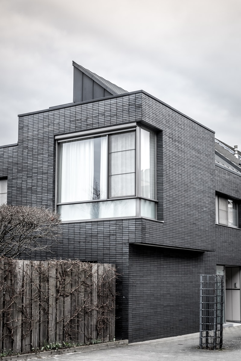 grayscale photography of 2-storey house